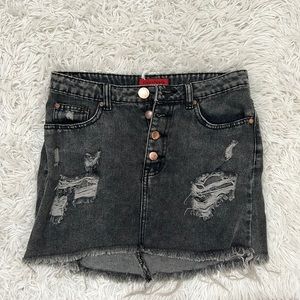 Ripped jean mini skirt